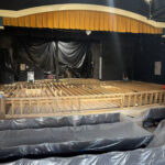 The stage rebuild in progress with new joists and new subfloors.